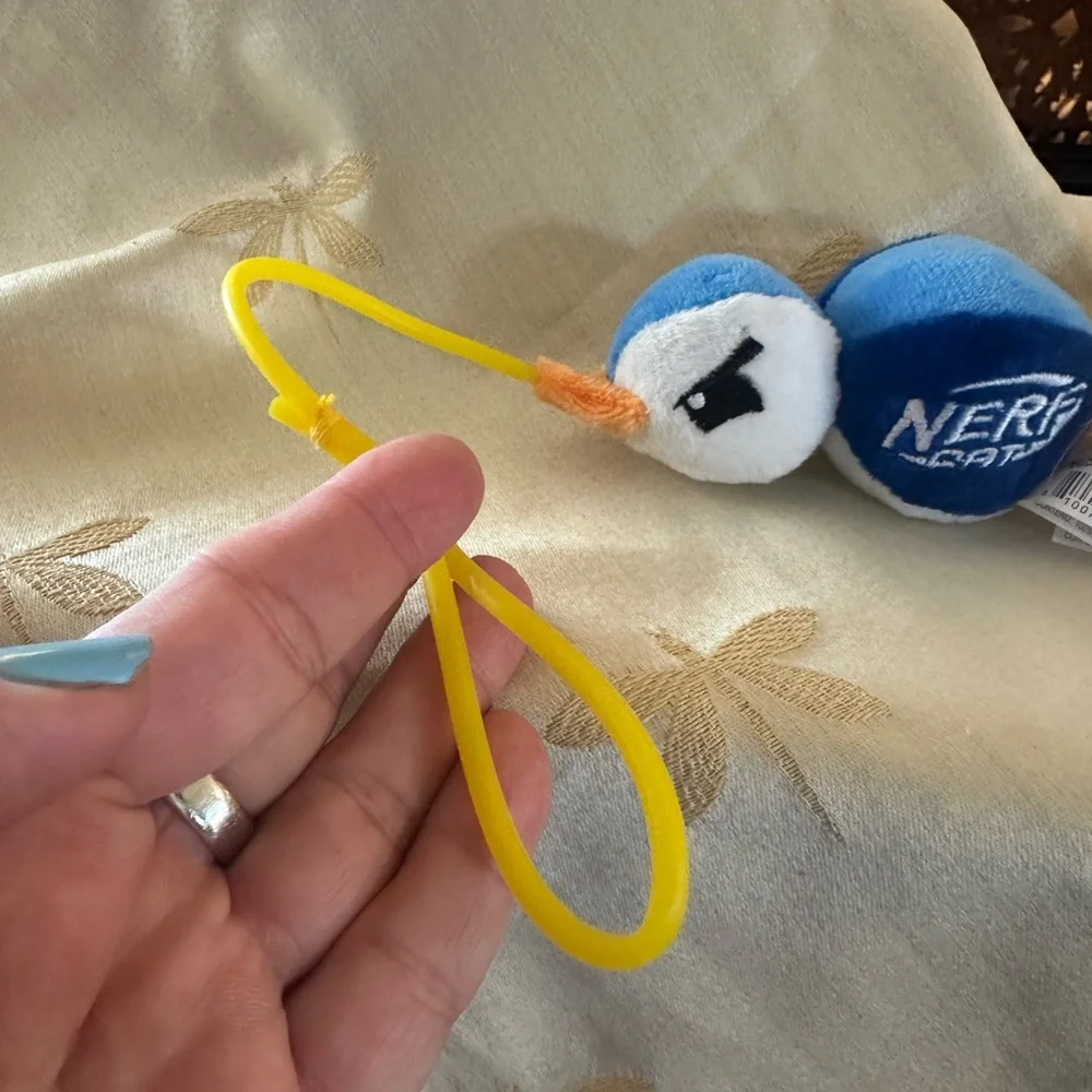 Nerf Cat Duck Launcher Plush Toy with Feather Bell & Launching Loop.